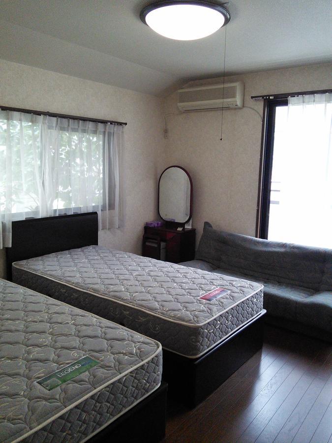 Guesthouse Cosmo Токусіма Екстер'єр фото